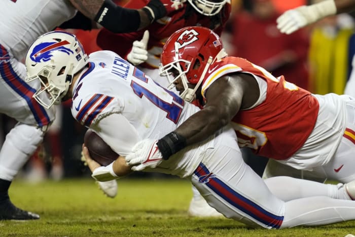 Kansas City Chiefs defensive tackle Jarran Reed (90) sacks Buffalo Bills quarterback Josh Allen (17). Mandatory Credit: Jay Biggerstaff-USA TODAY